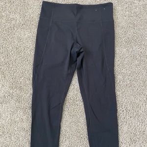 Gray athletic leggings with side pockets